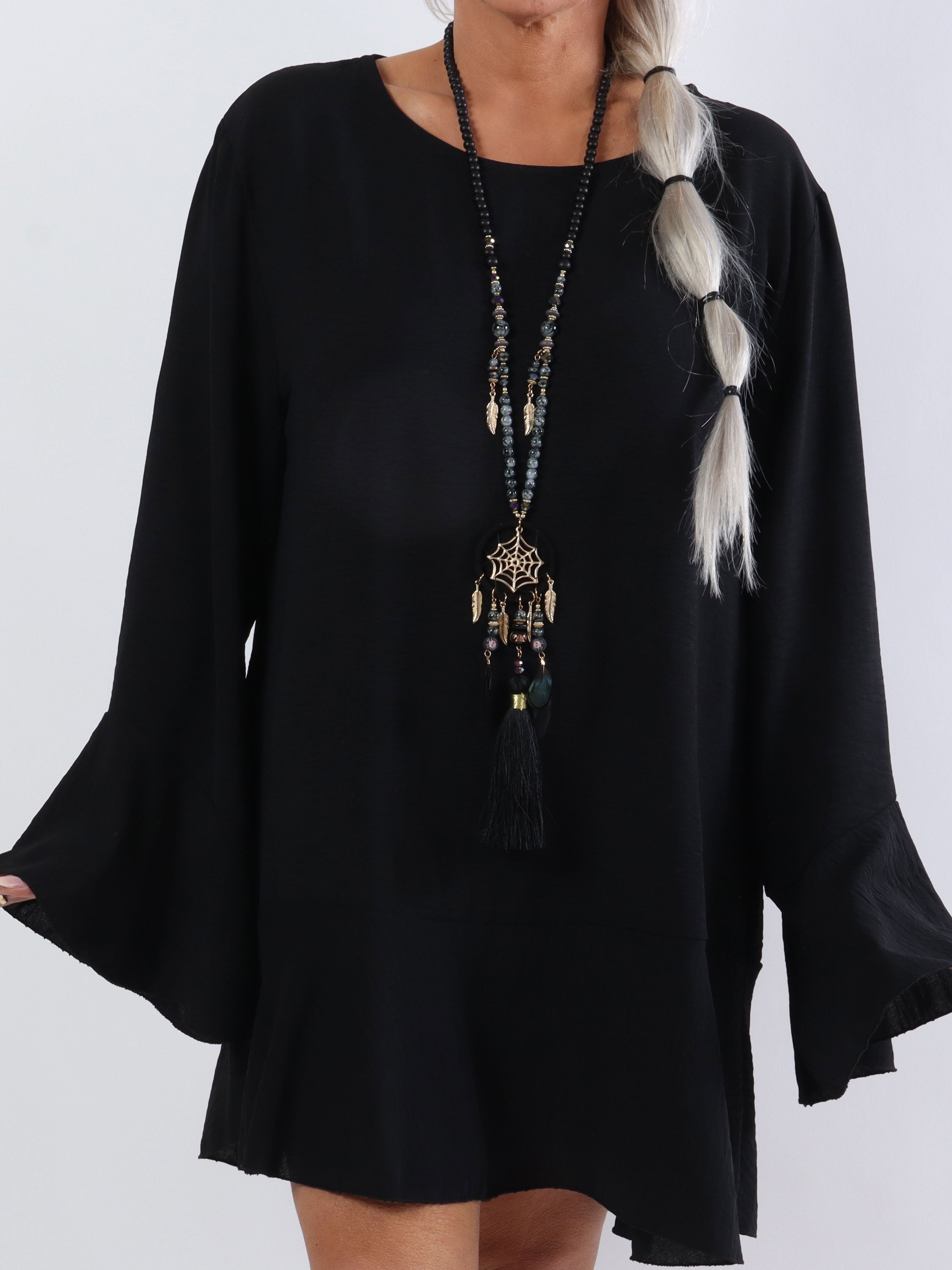 Linja - Plus size blus med volang på ärmen